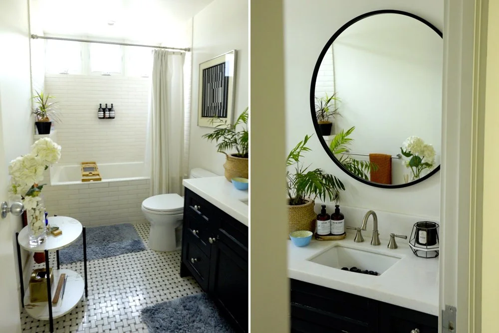 Large clean bathroom with oversized tub and round mirror