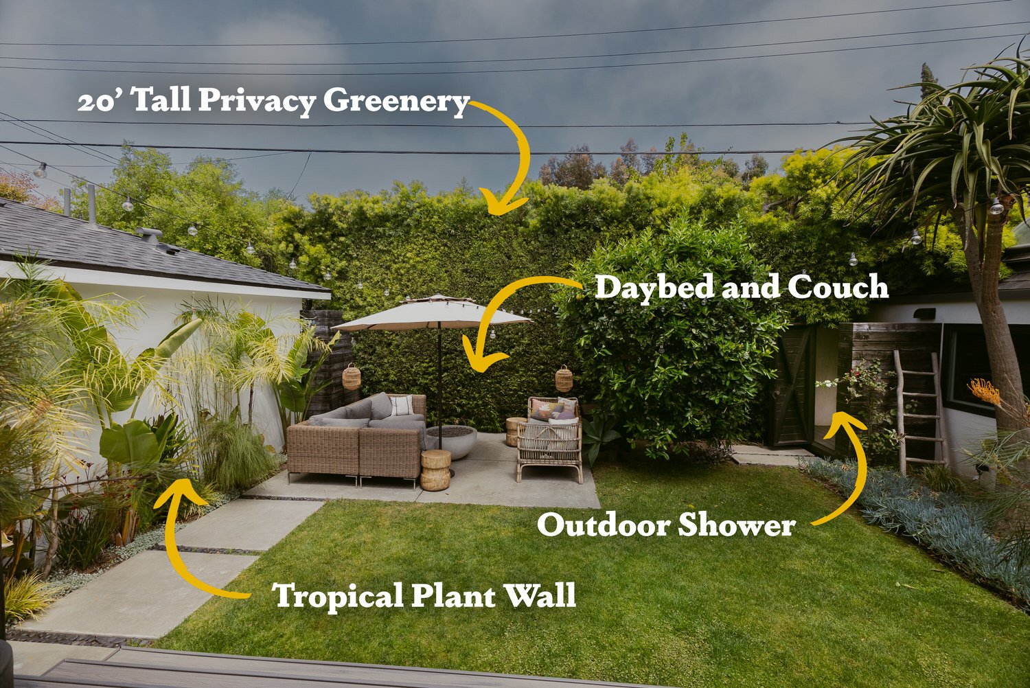 Private Bali-style backyard at the LA Boudoir Bungalow — 20ft privacy greenery, daybed, couch, and outdoor shower