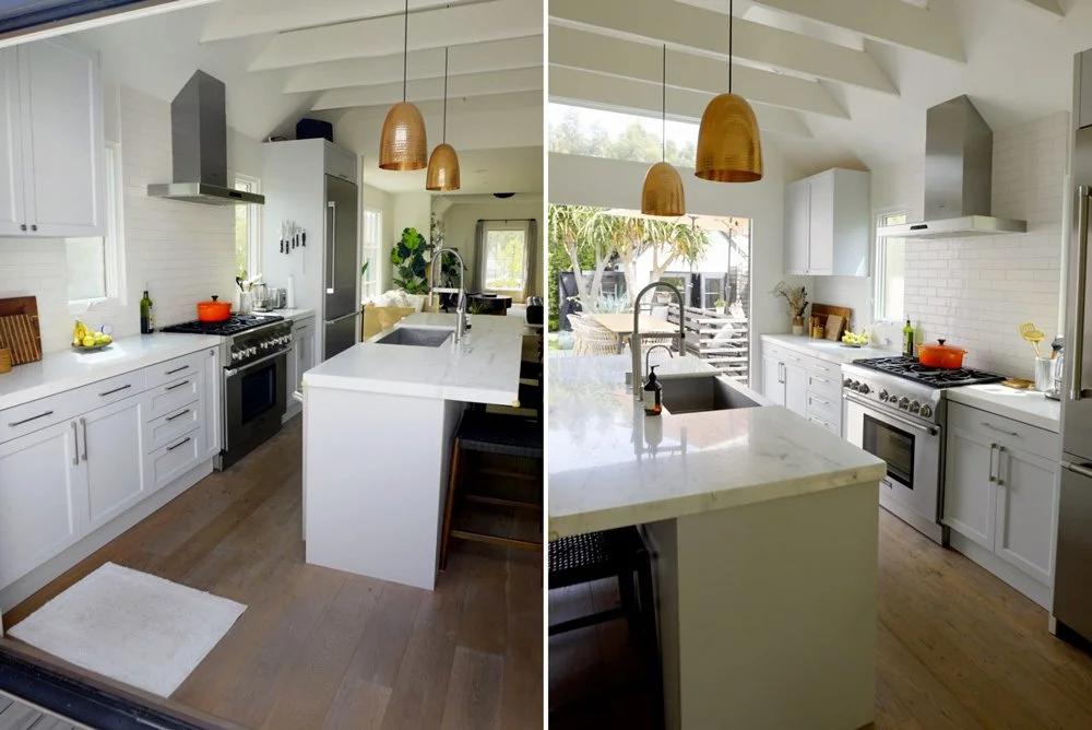 Clean modern kitchen with accordion doors and natural light
